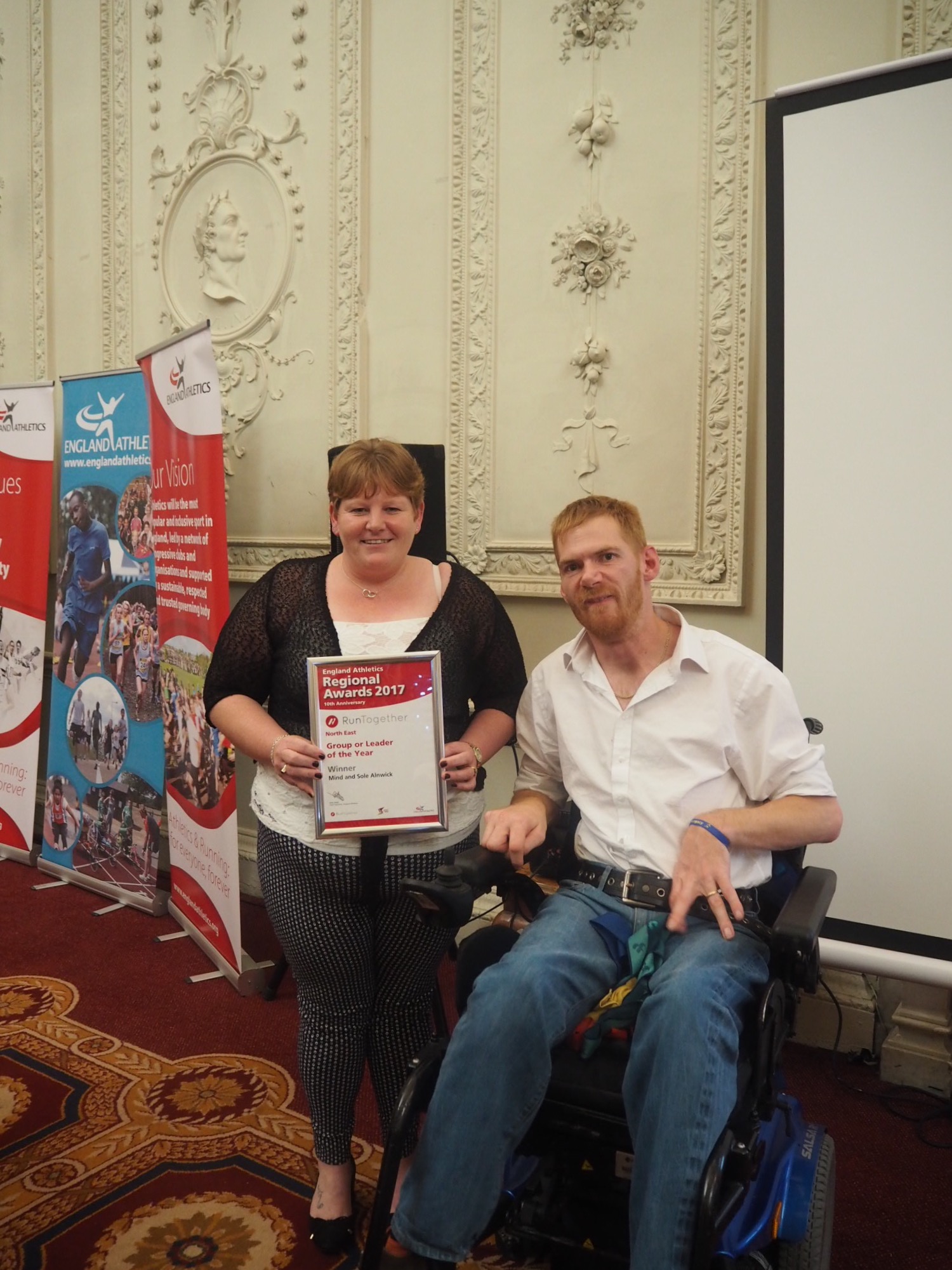 Wednesday winner- Christine with guest speake rPara Athlete Stephen Miller.jpg