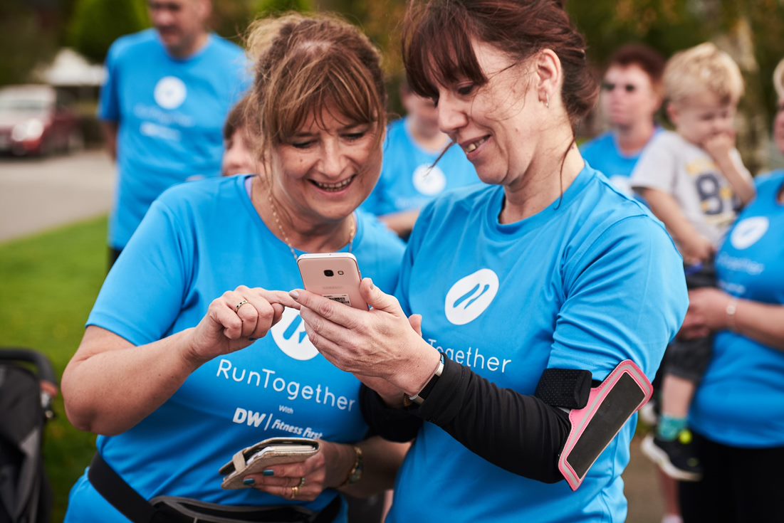 runners with mobile.jpeg