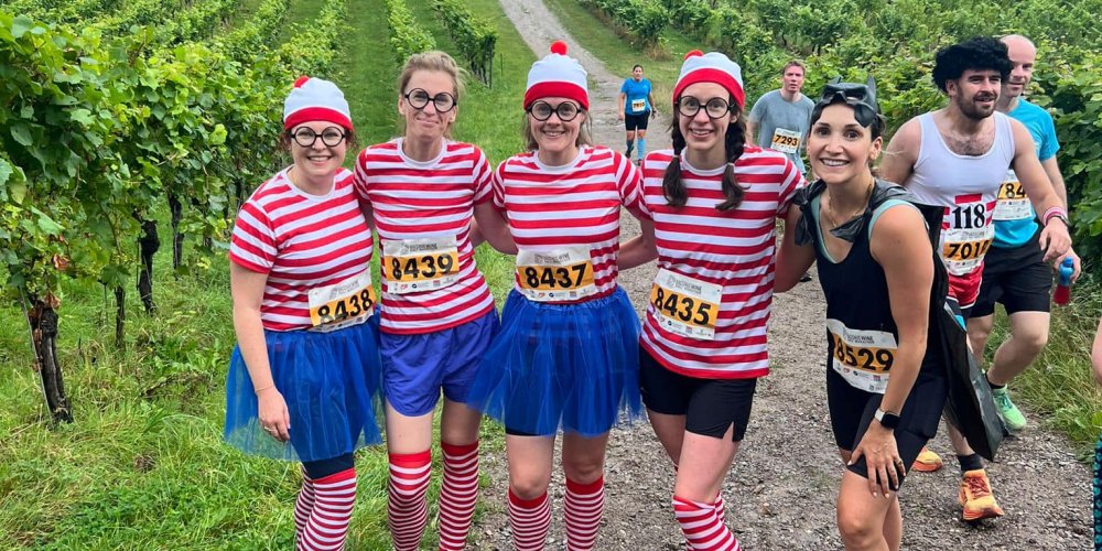 J and M runners dressed as Wally