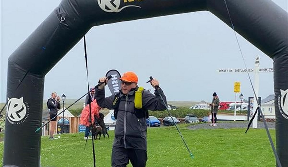 Bob Yates at finish line